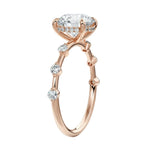 Top-down view of the rhythmic flat rose gold band with stones set in pairs