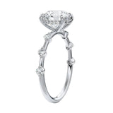 Top-down view of the rhythmic flat white gold band with stones set in pairs