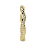 Top-down view of a D-color VVS1 1.5mm round stone twisted eternity wedding band in yellow gold.
