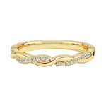 Yellow gold twisted infinity wedding band with pavé moissanite accents by ApolloGem.