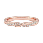 Rose gold twisted infinity wedding band with pavé moissanite accents by ApolloGem.