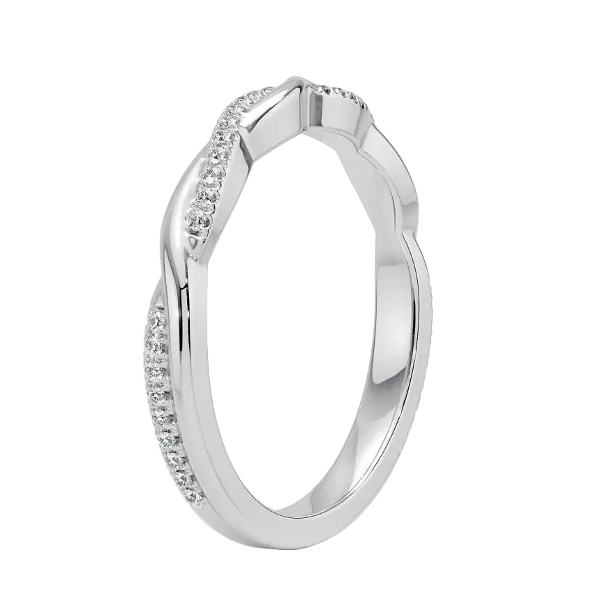 Close-up of a moissanite eternity ring featuring a braided metal and diamond-like vine design.