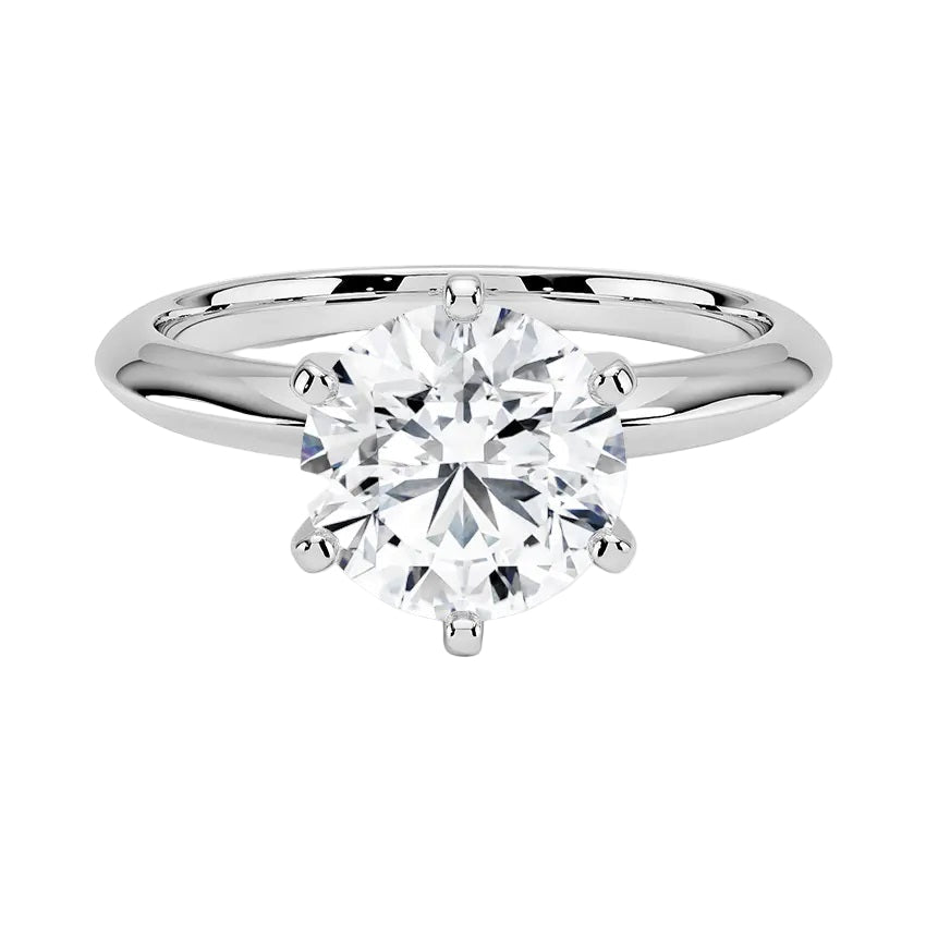 Six-prong round solitaire engagement ring with bi-metal gold design and high-quality GRI certified moissanite.