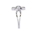 Silver ring with three gemstones on a white background